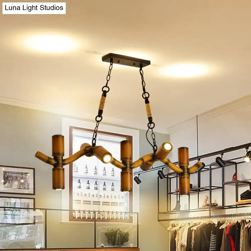 10-Light Metal Island Pendant in Brown with Wave Style, Pipe Shade, and Rope Detail".